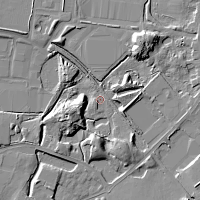 Shaded relief map of the ground around WV133AG, computed from Environment Agency LiDAR. The ground here sits at about 130 m above sea level and falls 13 m across the surrounding 800 m. Surface water reaching this point runs off ground lying to the west-south-west, 10.7 m higher.