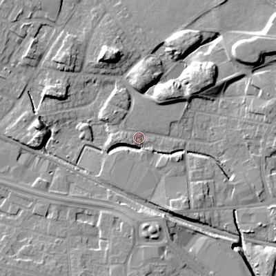 Shaded relief map of the ground around WV133DG, computed from Environment Agency LiDAR. The ground here sits at about 129 m above sea level and falls 14 m across the surrounding 800 m. Surface water reaching this point runs off ground lying to the west, 3.4 m higher.