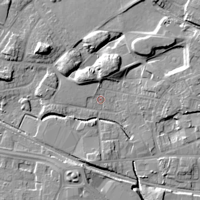 Shaded relief map of the ground around WV133DJ, computed from Environment Agency LiDAR. The ground here sits at about 128 m above sea level and falls 14 m across the surrounding 800 m. Surface water reaching this point runs off ground lying to the north-west, 9.4 m higher.
