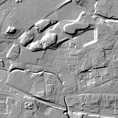 Shaded relief map of the ground around WV133DL, computed from Environment Agency LiDAR. The ground here sits at about 128 m above sea level and falls 14 m across the surrounding 800 m. Surface water reaching this point runs off ground lying to the north-north-west, 11.0 m higher.