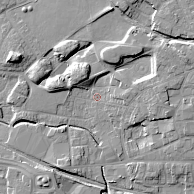 Shaded relief map of the ground around WV133DP, computed from Environment Agency LiDAR. The ground here sits at about 128 m above sea level and falls 14 m across the surrounding 800 m. Surface water reaching this point runs off ground lying to the north-north-west, 11.0 m higher.