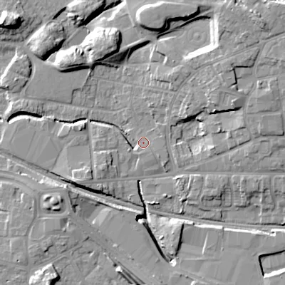 Shaded relief map of the ground around WV133DR, computed from Environment Agency LiDAR. The ground here sits at about 128 m above sea level and falls 15 m across the surrounding 800 m. Surface water reaching this point runs off ground lying to the north-north-west, 11.0 m higher.