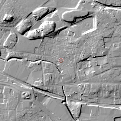 Shaded relief map of the ground around WV133DS, computed from Environment Agency LiDAR. The ground here sits at about 128 m above sea level and falls 15 m across the surrounding 800 m. Surface water reaching this point runs off ground lying to the north-north-west, 11.0 m higher.