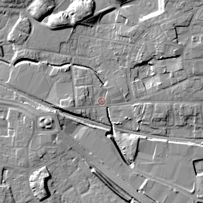 Shaded relief map of the ground around WV133DT, computed from Environment Agency LiDAR. The ground here sits at about 128 m above sea level and falls 13 m across the surrounding 800 m. Surface water reaching this point runs off ground lying to the north, 11.0 m higher.