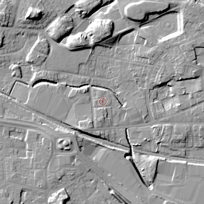 Shaded relief map of the ground around WV133DW, computed from Environment Agency LiDAR. The ground here sits at about 129 m above sea level and falls 15 m across the surrounding 800 m. Surface water reaching this point runs off ground lying to the south, 1.9 m higher.