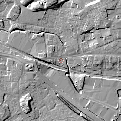 Shaded relief map of the ground around WV133DZ, computed from Environment Agency LiDAR. The ground here sits at about 128 m above sea level and falls 13 m across the surrounding 800 m. Surface water reaching this point runs off ground lying to the west, 5.1 m higher.