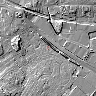 Shaded relief map of the ground around WV133EG, computed from Environment Agency LiDAR. The ground here sits at about 129 m above sea level and falls 15 m across the surrounding 800 m. Surface water reaching this point runs off ground lying to the east-south-east, 7.0 m higher.