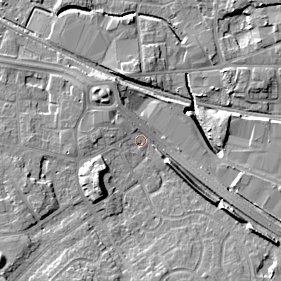 Shaded relief map of the ground around WV133EQ, computed from Environment Agency LiDAR. The ground here sits at about 129 m above sea level and falls 15 m across the surrounding 800 m. Surface water reaching this point runs off ground lying to the south-west, 8.3 m higher.