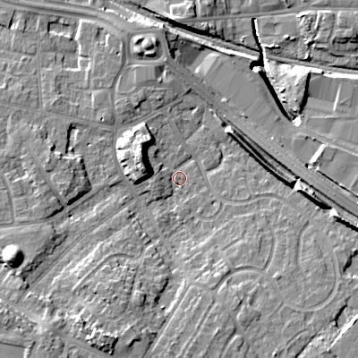 Shaded relief map of the ground around WV133ER, computed from Environment Agency LiDAR. The ground here sits at about 129 m above sea level and falls 16 m across the surrounding 800 m. Surface water reaching this point runs off ground lying to the south-south-west, 10.7 m higher.