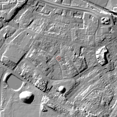 Shaded relief map of the ground around WV133TU, computed from Environment Agency LiDAR. The ground here sits at about 132 m above sea level and falls 12 m across the surrounding 800 m. Surface water reaching this point runs off ground lying to the south, 8.3 m higher.