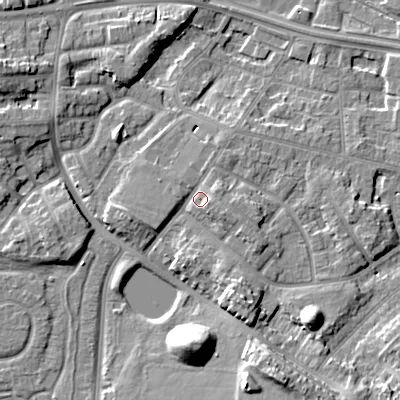 Shaded relief map of the ground around WV133TY, computed from Environment Agency LiDAR. The ground here sits at about 133 m above sea level and falls 12 m across the surrounding 800 m. Surface water reaching this point runs off ground lying to the east-north-east, 2.4 m higher.