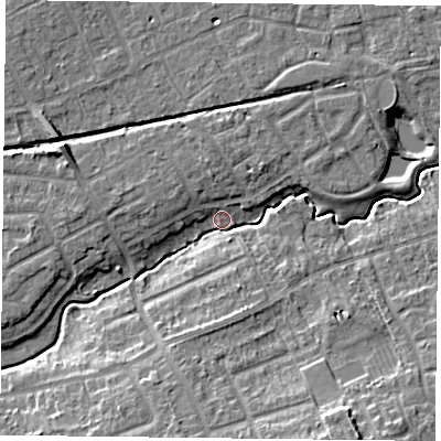 Shaded relief map of the ground around YO103RU, computed from Environment Agency LiDAR. The ground here sits at about 11 m above sea level and falls 11 m across the surrounding 800 m. Surface water reaching this point runs off ground lying to the south, 7.3 m higher.