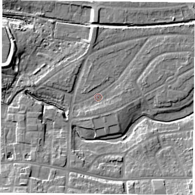 Shaded relief map of the ground around YO103TD, computed from Environment Agency LiDAR. The ground here sits at about 11 m above sea level and falls 12 m across the surrounding 800 m. Surface water reaching this point runs off ground lying to the north, 4.3 m higher.