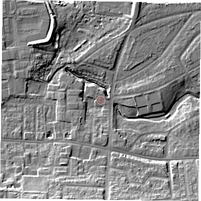 Shaded relief map of the ground around YO103TX, computed from Environment Agency LiDAR. The ground here sits at about 11 m above sea level and falls 16 m across the surrounding 800 m. Surface water reaching this point runs off ground lying to the south, 5.5 m higher.
