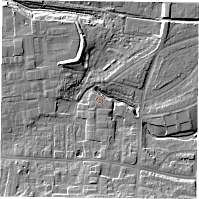 Shaded relief map of the ground around YO103UR, computed from Environment Agency LiDAR. The ground here sits at about 12 m above sea level and falls 13 m across the surrounding 800 m. Surface water reaching this point runs off ground lying to the south-south-east, 7.5 m higher.