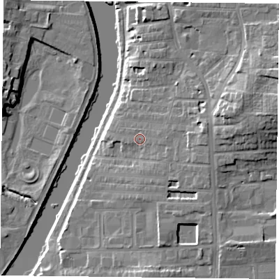 Shaded relief map of the ground around YO104BR, computed from Environment Agency LiDAR. The ground here sits at about 13 m above sea level and falls 16 m across the surrounding 800 m. Surface water reaching this point runs off ground lying to the east, 1.7 m higher.