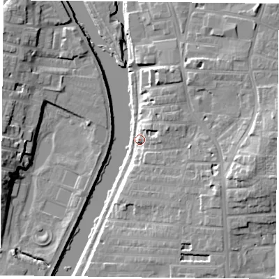 Shaded relief map of the ground around YO104BU, computed from Environment Agency LiDAR. The ground here sits at about 11 m above sea level and falls 15 m across the surrounding 800 m. Surface water reaching this point runs off ground lying to the east, 12.2 m higher.