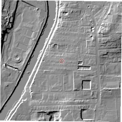 Shaded relief map of the ground around YO104DP, computed from Environment Agency LiDAR. The ground here sits at about 12 m above sea level and falls 16 m across the surrounding 800 m. Surface water reaching this point runs off ground lying to the east-north-east, 4.8 m higher.