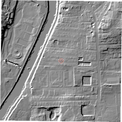 Shaded relief map of the ground around YO104DR, computed from Environment Agency LiDAR. The ground here sits at about 12 m above sea level and falls 16 m across the surrounding 800 m. Surface water reaching this point runs off ground lying to the east-south-east, 3.3 m higher.