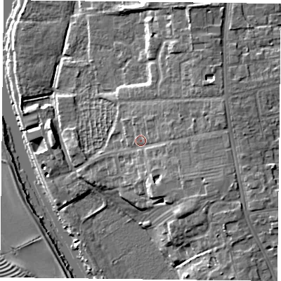 Shaded relief map of the ground around YO104PF, computed from Environment Agency LiDAR. The ground here sits at about 13 m above sea level and falls 13 m across the surrounding 800 m. Surface water reaching this point runs off ground lying to the south-east, 4.1 m higher.