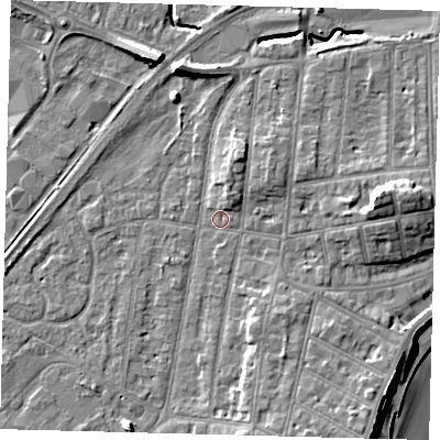 Shaded relief map of the ground around YO153PH, computed from Environment Agency LiDAR. The ground here sits at about 10 m above sea level and falls 14 m across the surrounding 800 m. Surface water reaching this point runs off ground lying to the east, 6.1 m higher.
