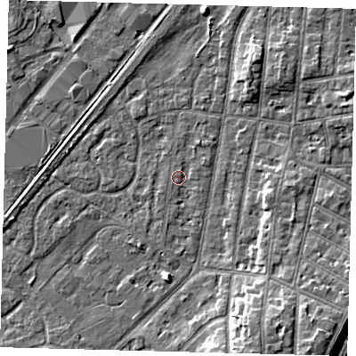 Shaded relief map of the ground around YO153PW, computed from Environment Agency LiDAR. The ground here sits at about 10 m above sea level and falls 10 m across the surrounding 800 m. Surface water reaching this point runs off ground lying to the north-north-east, 1.3 m higher.