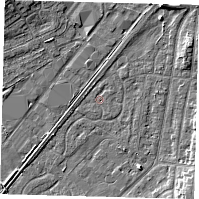 Shaded relief map of the ground around YO153TF, computed from Environment Agency LiDAR. The ground here sits at about 10 m above sea level and falls 7 m across the surrounding 800 m. Surface water reaching this point runs off ground lying to the north-north-west, 2.2 m higher.
