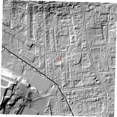 Shaded relief map of the ground around YO164BF, computed from Environment Agency LiDAR. The ground here sits at about 11 m above sea level and falls 16 m across the surrounding 800 m. Surface water reaching this point runs off ground lying to the north-east, 1.8 m higher.
