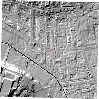 Shaded relief map of the ground around YO164HE, computed from Environment Agency LiDAR. The ground here sits at about 11 m above sea level and falls 17 m across the surrounding 800 m. Surface water reaching this point runs off ground lying to the north, 8.1 m higher.