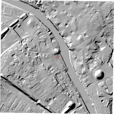 Shaded relief map of the ground around YO16LT, computed from Environment Agency LiDAR. The ground here sits at about 9 m above sea level and falls 20 m across the surrounding 800 m. Surface water reaching this point runs off ground lying to the west, 12.5 m higher.