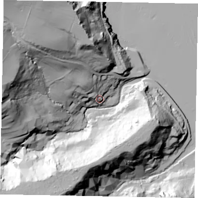 Shaded relief map of the ground around YO213TE, computed from Environment Agency LiDAR. The ground here sits at about 16 m above sea level and falls 86 m across the surrounding 800 m. Surface water reaching this point runs off ground lying to the north-west, 27.7 m higher.