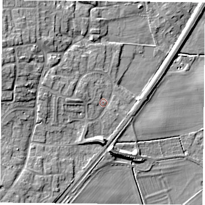Shaded relief map of the ground around YO233TZ, computed from Environment Agency LiDAR. The ground here sits at about 13 m above sea level and falls 12 m across the surrounding 800 m. Surface water reaching this point runs off ground lying to the south, 6.7 m higher.