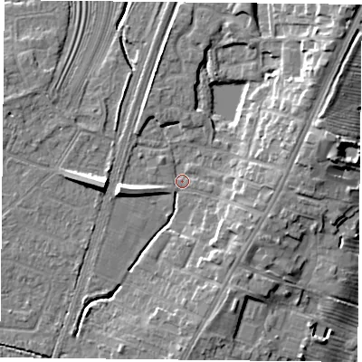 Shaded relief map of the ground around YO241HP, computed from Environment Agency LiDAR. The ground here sits at about 13 m above sea level and falls 11 m across the surrounding 800 m. Surface water reaching this point runs off ground lying to the west, 7.9 m higher.