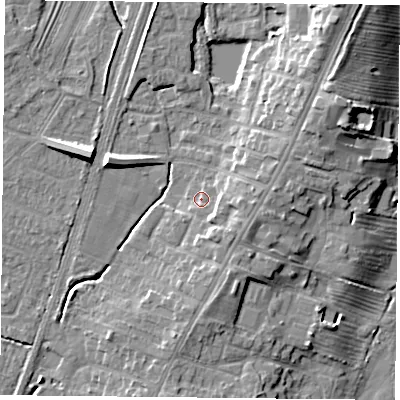 Shaded relief map of the ground around YO241LL, computed from Environment Agency LiDAR. The ground here sits at about 14 m above sea level and falls 12 m across the surrounding 800 m. Surface water reaching this point runs off ground lying to the east, 3.6 m higher.