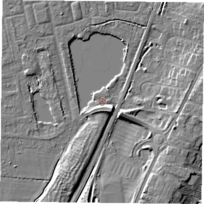 Shaded relief map of the ground around YO242QU, computed from Environment Agency LiDAR. The ground here sits at about 13 m above sea level and falls 9 m across the surrounding 800 m. Surface water reaching this point runs off ground lying to the south-east, 6.6 m higher.