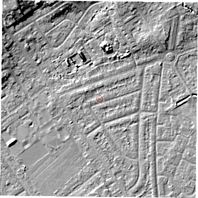 Shaded relief map of the ground around YO243AS, computed from Environment Agency LiDAR. The ground here sits at about 14 m above sea level and falls 10 m across the surrounding 800 m. Surface water reaching this point runs off ground lying to the west, 0.6 m higher.