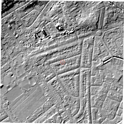 Shaded relief map of the ground around YO243AT, computed from Environment Agency LiDAR. The ground here sits at about 14 m above sea level and falls 9 m across the surrounding 800 m. Surface water reaching this point runs off ground lying to the south-east, 0.7 m higher.