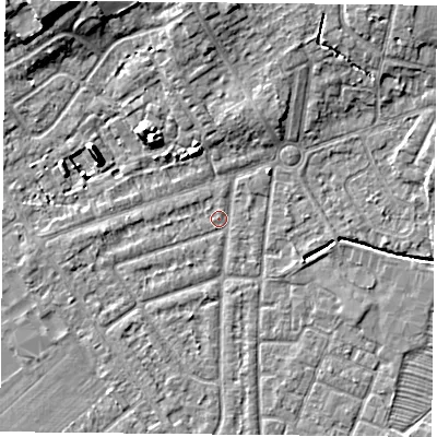 Shaded relief map of the ground around YO243AU, computed from Environment Agency LiDAR. The ground here sits at about 14 m above sea level and falls 10 m across the surrounding 800 m. Surface water reaching this point runs off ground lying to the north, 5.2 m higher.