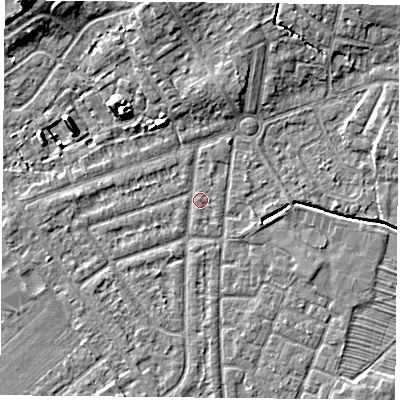 Shaded relief map of the ground around YO243AX, computed from Environment Agency LiDAR. The ground here sits at about 14 m above sea level and falls 9 m across the surrounding 800 m. Surface water reaching this point runs off ground lying to the north, 4.7 m higher.