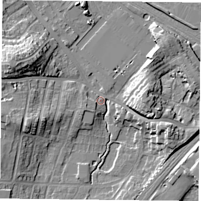 Shaded relief map of the ground around YO244DF, computed from Environment Agency LiDAR. The ground here sits at about 11 m above sea level and falls 18 m across the surrounding 800 m. Surface water reaching this point runs off ground lying to the west-north-west, 17.6 m higher.