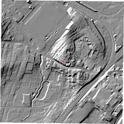 Shaded relief map of the ground around YO244DL, computed from Environment Agency LiDAR. The ground here sits at about 19 m above sea level and falls 16 m across the surrounding 800 m. Surface water reaching this point runs off ground lying to the north-east, 9.3 m higher.