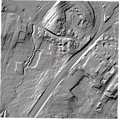 Shaded relief map of the ground around YO244DP, computed from Environment Agency LiDAR. The ground here sits at about 11 m above sea level and falls 16 m across the surrounding 800 m. Surface water reaching this point runs off ground lying to the north-east, 10.0 m higher.