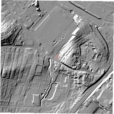 Shaded relief map of the ground around YO244DQ, computed from Environment Agency LiDAR. The ground here sits at about 11 m above sea level and falls 18 m across the surrounding 800 m. Surface water reaching this point runs off ground lying to the east, 12.8 m higher.