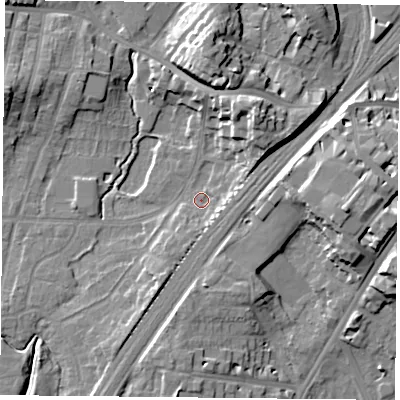 Shaded relief map of the ground around YO244DR, computed from Environment Agency LiDAR. The ground here sits at about 11 m above sea level and falls 16 m across the surrounding 800 m. Surface water reaching this point runs off ground lying to the south-south-west, 5.4 m higher.