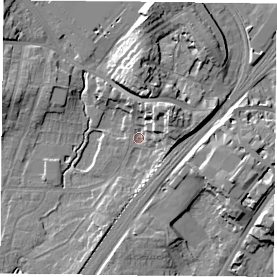 Shaded relief map of the ground around YO244DW, computed from Environment Agency LiDAR. The ground here sits at about 10 m above sea level and falls 16 m across the surrounding 800 m. Surface water reaching this point runs off ground lying to the north-east, 12.1 m higher.
