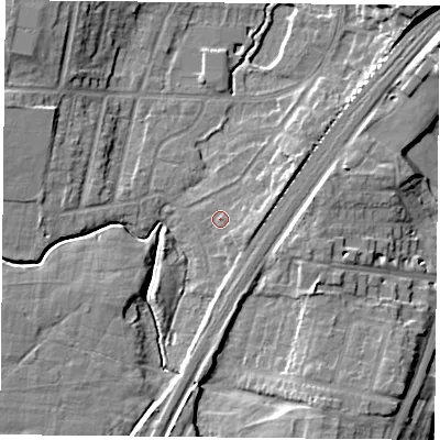 Shaded relief map of the ground around YO244DZ, computed from Environment Agency LiDAR. The ground here sits at about 12 m above sea level and falls 11 m across the surrounding 800 m. Surface water reaching this point runs off ground lying to the east-south-east, 2.3 m higher.