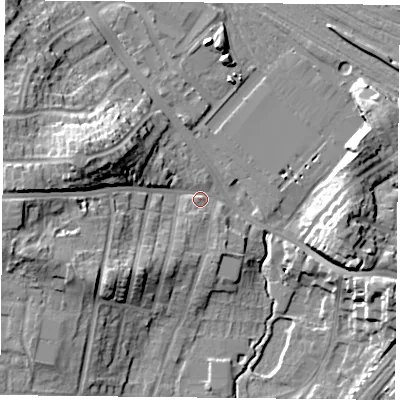 Shaded relief map of the ground around YO244EN, computed from Environment Agency LiDAR. The ground here sits at about 12 m above sea level and falls 18 m across the surrounding 800 m. Surface water reaching this point runs off ground lying to the west-north-west, 14.7 m higher.