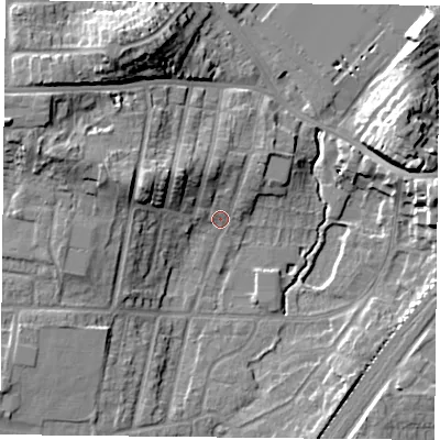 Shaded relief map of the ground around YO244JL, computed from Environment Agency LiDAR. The ground here sits at about 11 m above sea level and falls 18 m across the surrounding 800 m. Surface water reaching this point runs off ground lying to the west-north-west, 13.0 m higher.
