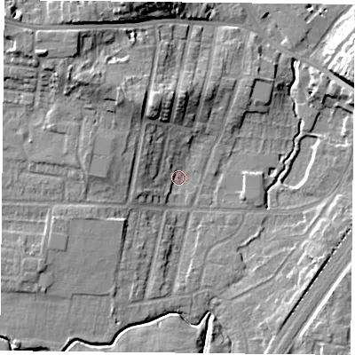 Shaded relief map of the ground around YO244JN, computed from Environment Agency LiDAR. The ground here sits at about 10 m above sea level and falls 18 m across the surrounding 800 m. Surface water reaching this point runs off ground lying to the west-north-west, 5.5 m higher.
