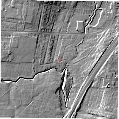 Shaded relief map of the ground around YO244JT, computed from Environment Agency LiDAR. The ground here sits at about 12 m above sea level and falls 10 m across the surrounding 800 m. Surface water reaching this point runs off ground lying to the west-south-west, 1.0 m higher.